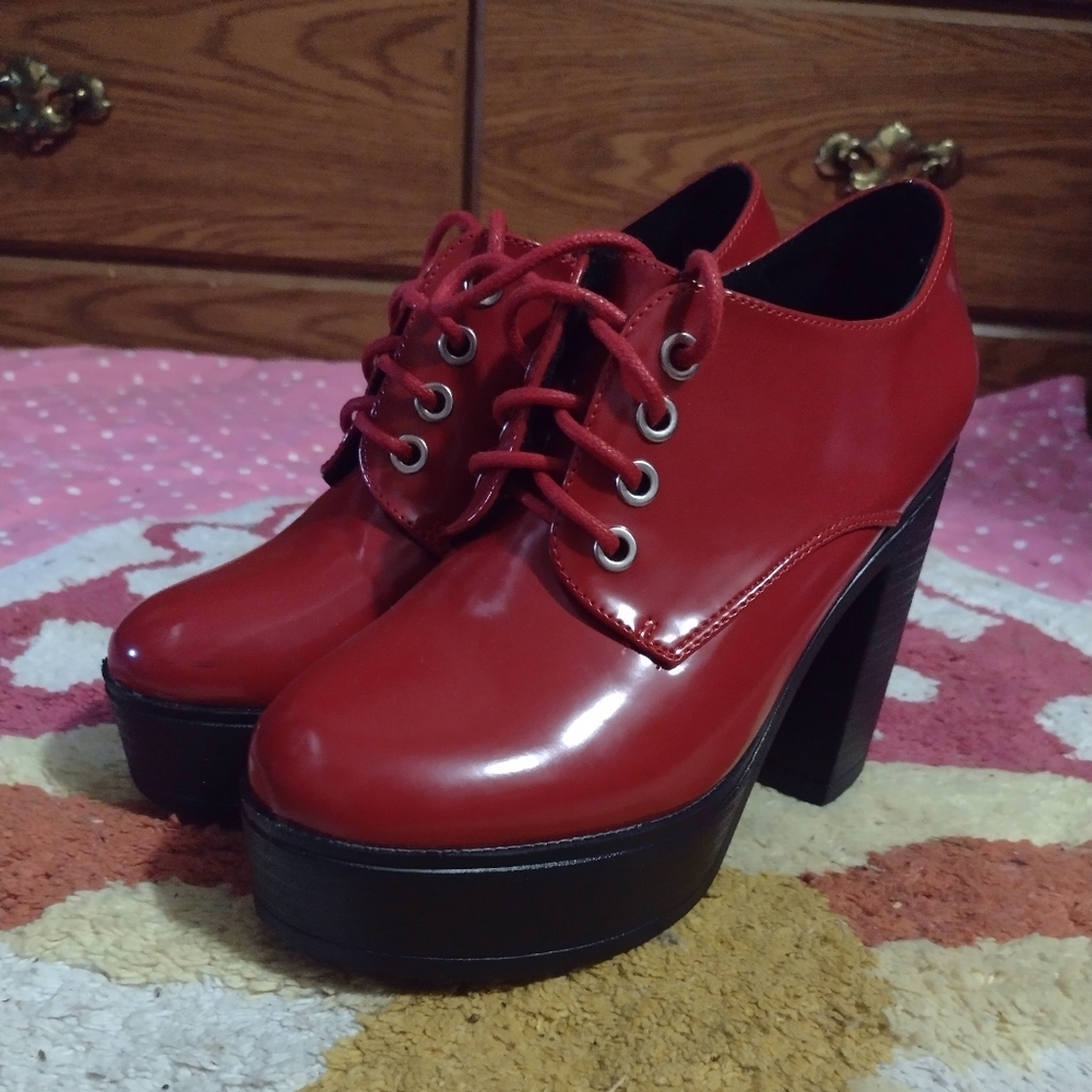 Red and black chunky fo leather heels the brand is Allegra K